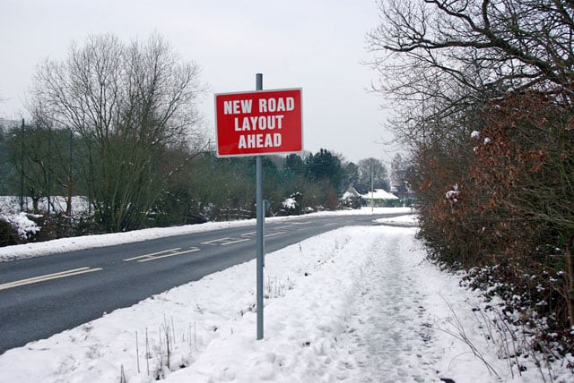 New road layout ahead sign, which we see as a metaphor for Next JS development based websites.