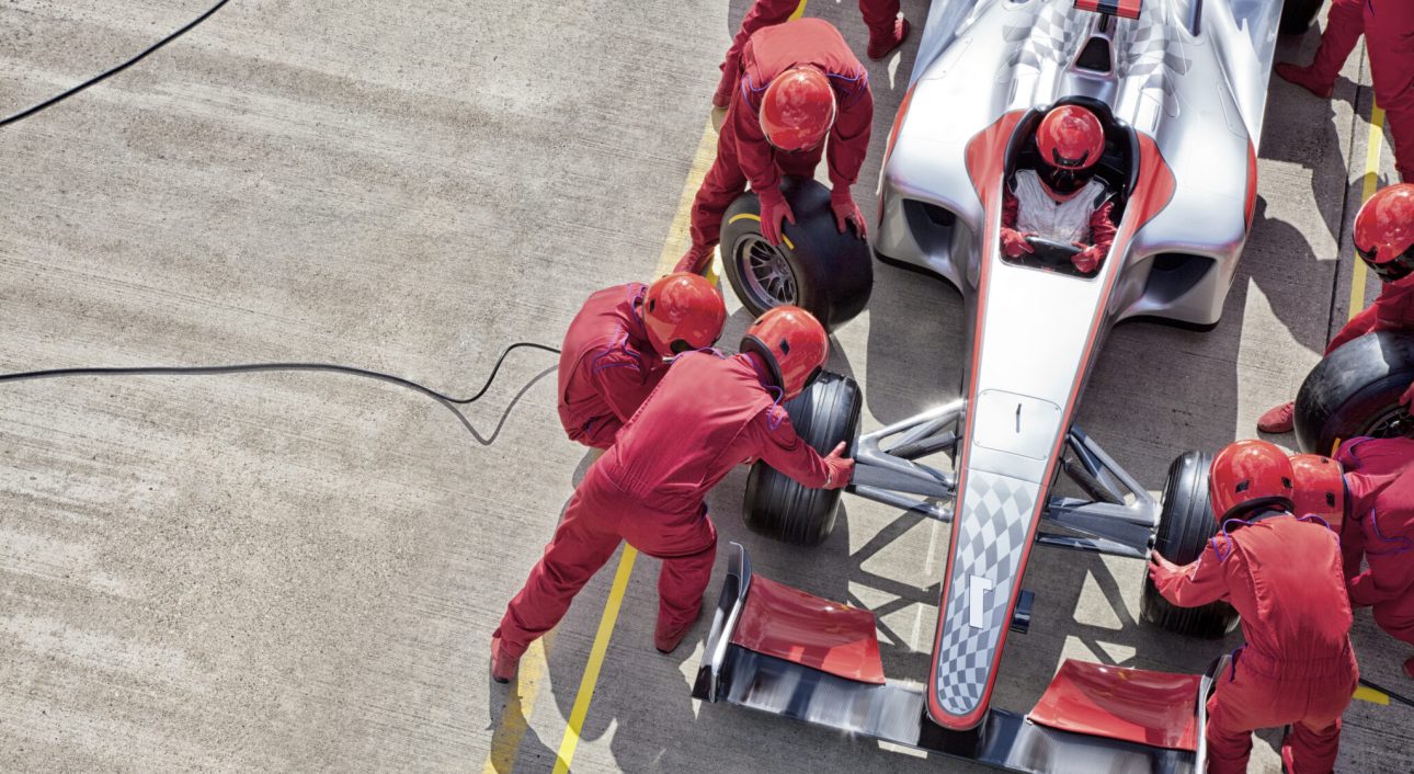Racing team working at pit stop